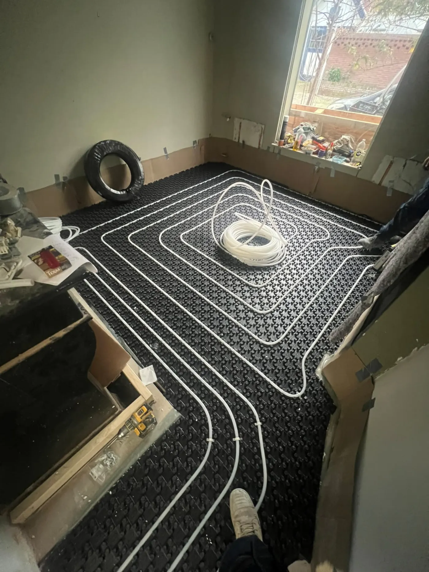 Vloerverwarming in een woonkamer door PersianTop